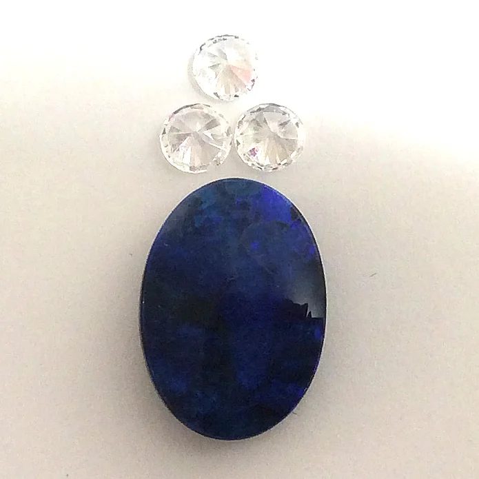 A remade set of earrings and a pendant from the Gemwaith R T Jewellery workshop