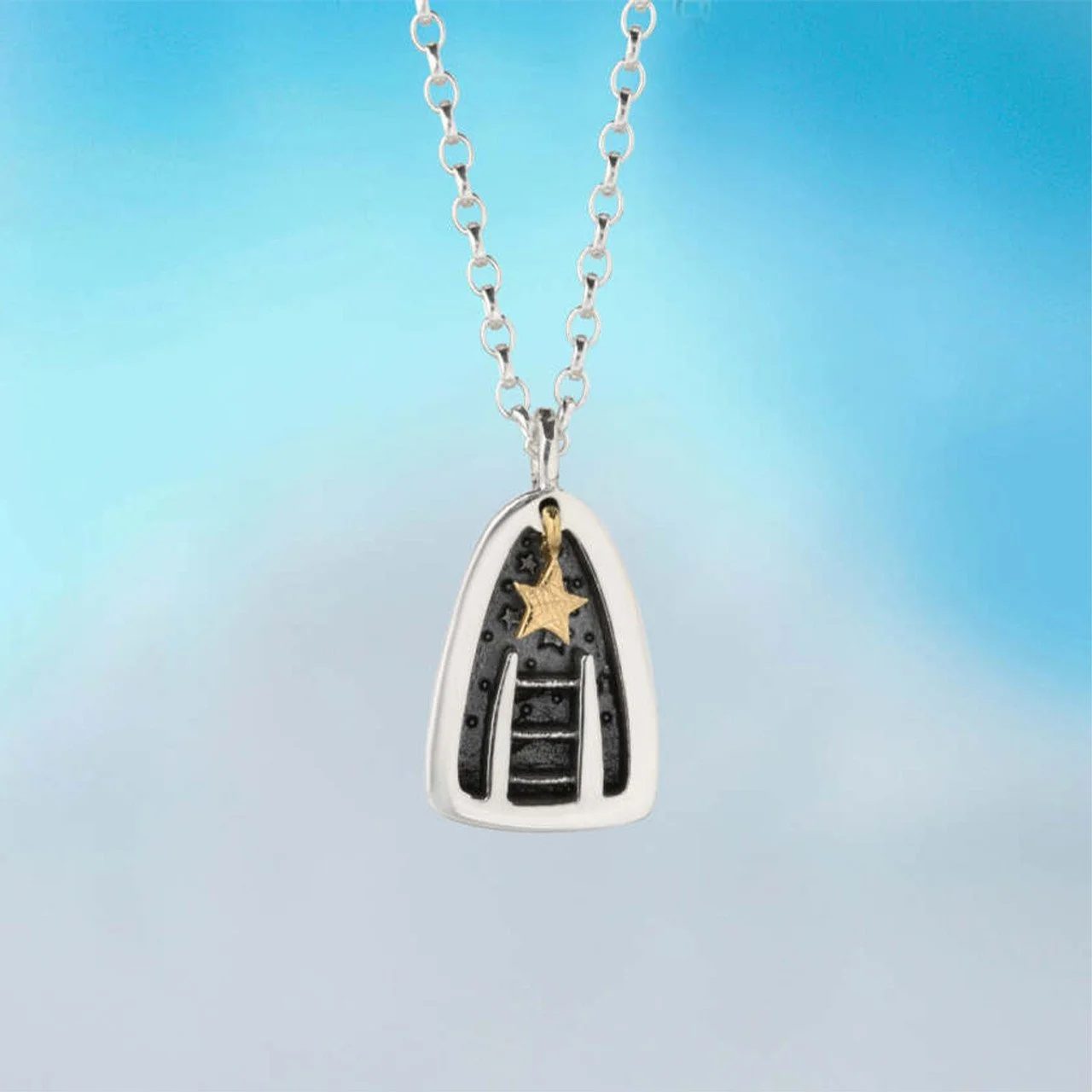 Alan Ardiff kinetic gold pendant, from the cabinet.